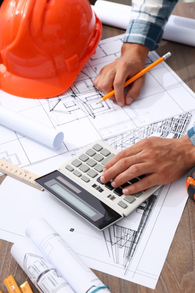 Drawings for building a house on the table