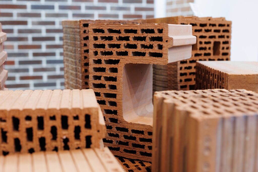 Samples of ceramic bricks. Hollow brick. Material for the construction of walls and partitions.